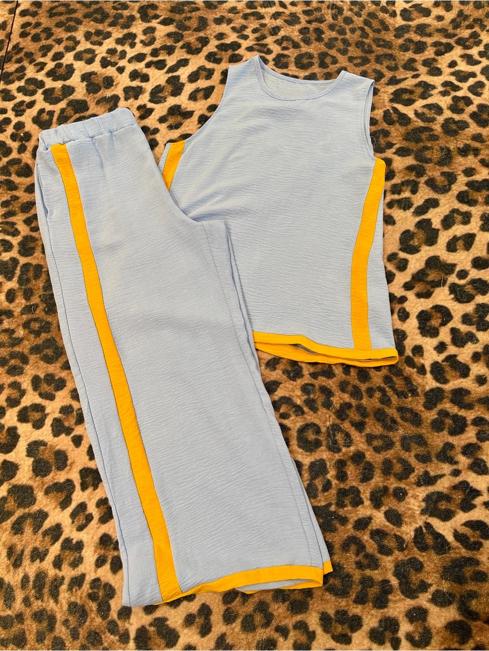 Women’s Light Blue two piece set, yellow trim.